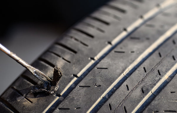 5 Ways a Tire Repair Kit Can Save Your Road Trip: An Essential Guide