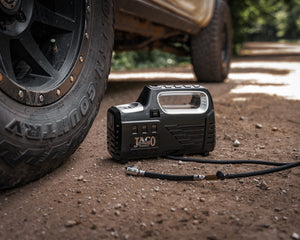 JACO SmartPro portable air compressor inflating a car tire