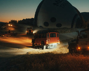 Off-road 4x4 vehicle with aired-down tires on a rugged trail