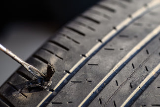 5 Ways a Tire Repair Kit Can Save Your Road Trip: An Essential Guide